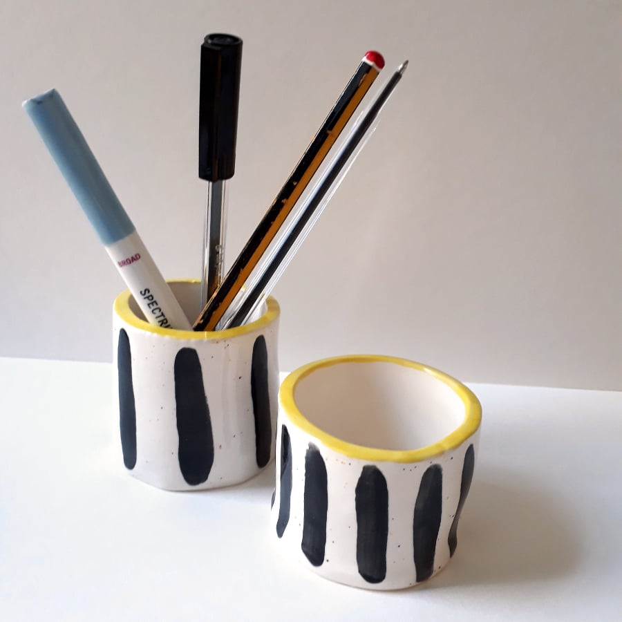 2 yellow stripe pots with penssquare 1
