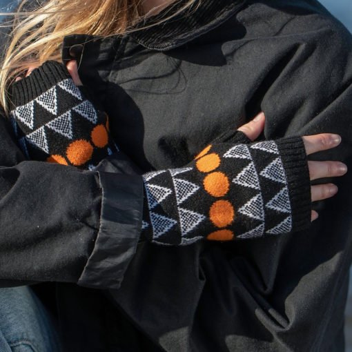 Solar Wrist Warmers in Black, Orange And White by Island Nation