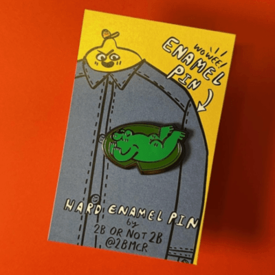 Snoozing Frog Enamel Pin