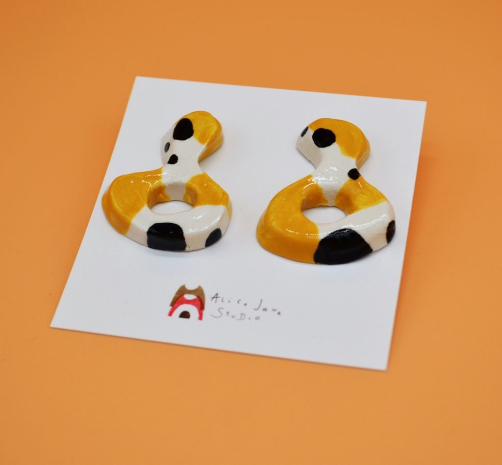 ochre black hollow statement